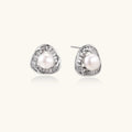 Triangular white gold plated stud earrings with central freshwater pearl and baguette-cut stones on white background